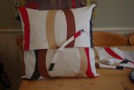 RED/WHITE/BLACK TIE FRONT CUSHION