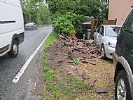 Wall demolished by car