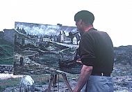 Dad painting Portsoy Harbour