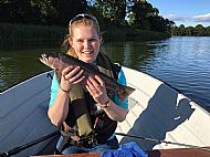 Catherine Poxon with a rainbow