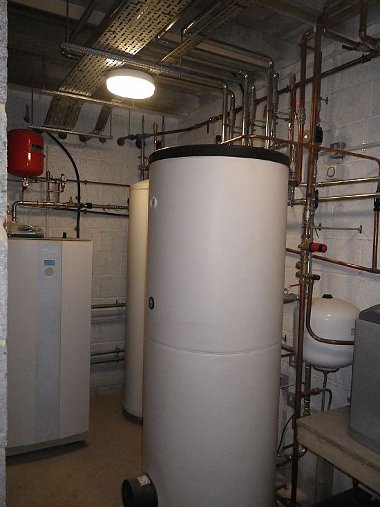 Ground Source Heat Pump Servicing Home