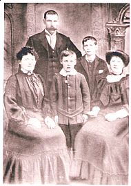 Duncan is the older boy with his family 