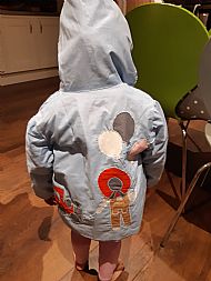 Ella's new coat blue side