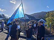 Flag bearer  Fintan McLoughlin, the grandson of Alan Macdonald of Glencoe, 