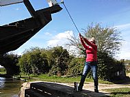 Shelley swinging on a lift bridge