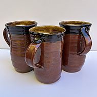 Three red mugs