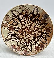 Platter decorated with three iron oxide glazes