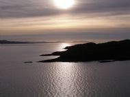 View from Ard Ghunel across Camuscross Bay and down the Sound of Sleat, with Ardnamurchan peninsula in the distance