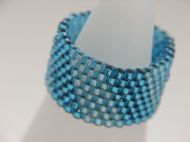 SILVER LINED & MATT TURQUOISE DELICA BEADS IN DIAGONAL STRIPED DESIGN