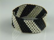 METALLIC SILVER & BLACK DELICA BEADS IN DIAGONAL STRIPED DESIGN