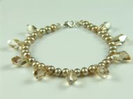 FRESH WATER PEARLS WITH CRYSTAL POLYGON BEADS IN CHAMPAGNE