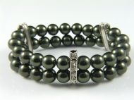 SWAROVSKI PEARL CUFF ON ELASTIC WITH PLATED METAL BARS WITH INLAID CRYSTALS IN CHOCOLATE