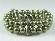 SWAROVSKI PEARL CUFF ON ELASTIC WITH PLATED METAL BARS WITH INLAID CRYSTALS IN LIGHT GREEN