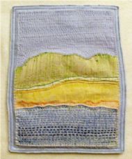 Finished art quilt by kay warner. made from fabric rubbings taken on the pier.