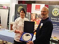 DGE Jim Houston presents the plate to Abbie