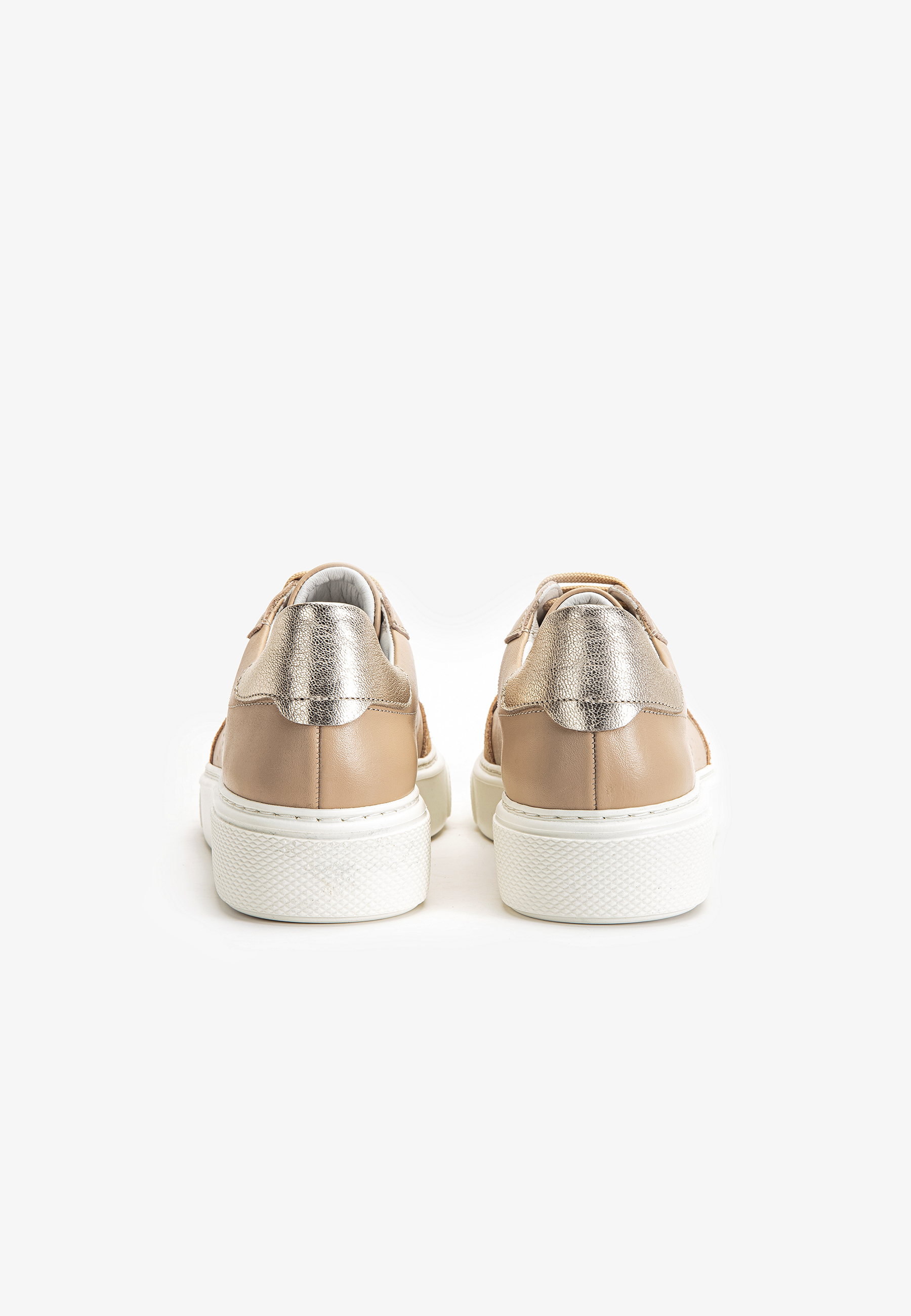 nude and gold sneakers