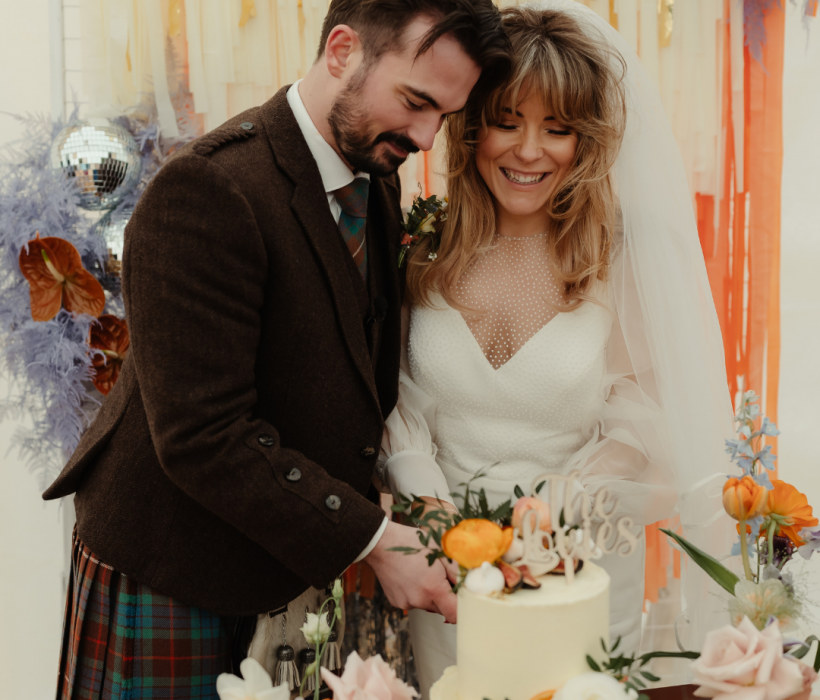 sassi holford festival bride wearing saskia wedding dress