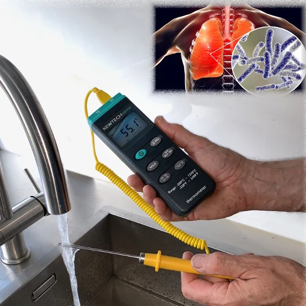 Legionnaires testing kit being ran under running water from a kitchen tap