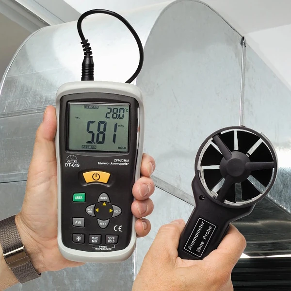 Engineer using the ATP AAVM-619 = remote Thermo-Anemometer at an HVAC vent