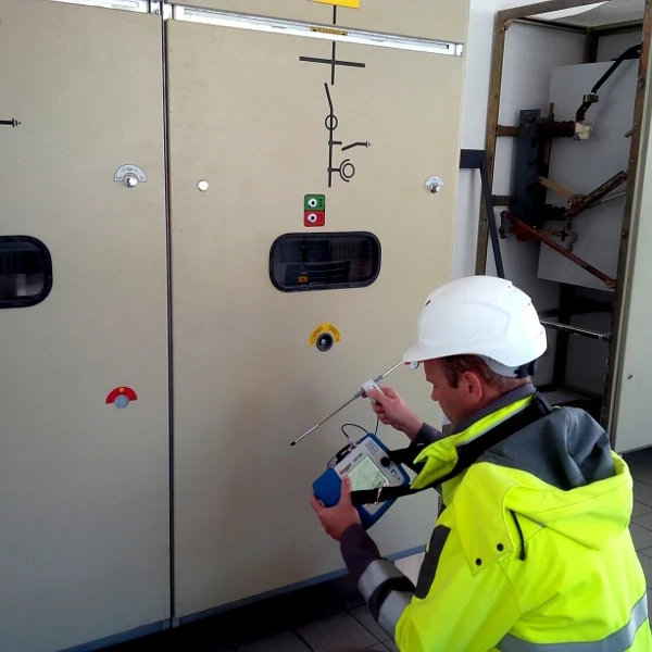 Engineer using the Megger UHF PDD Partial Discharge Detector