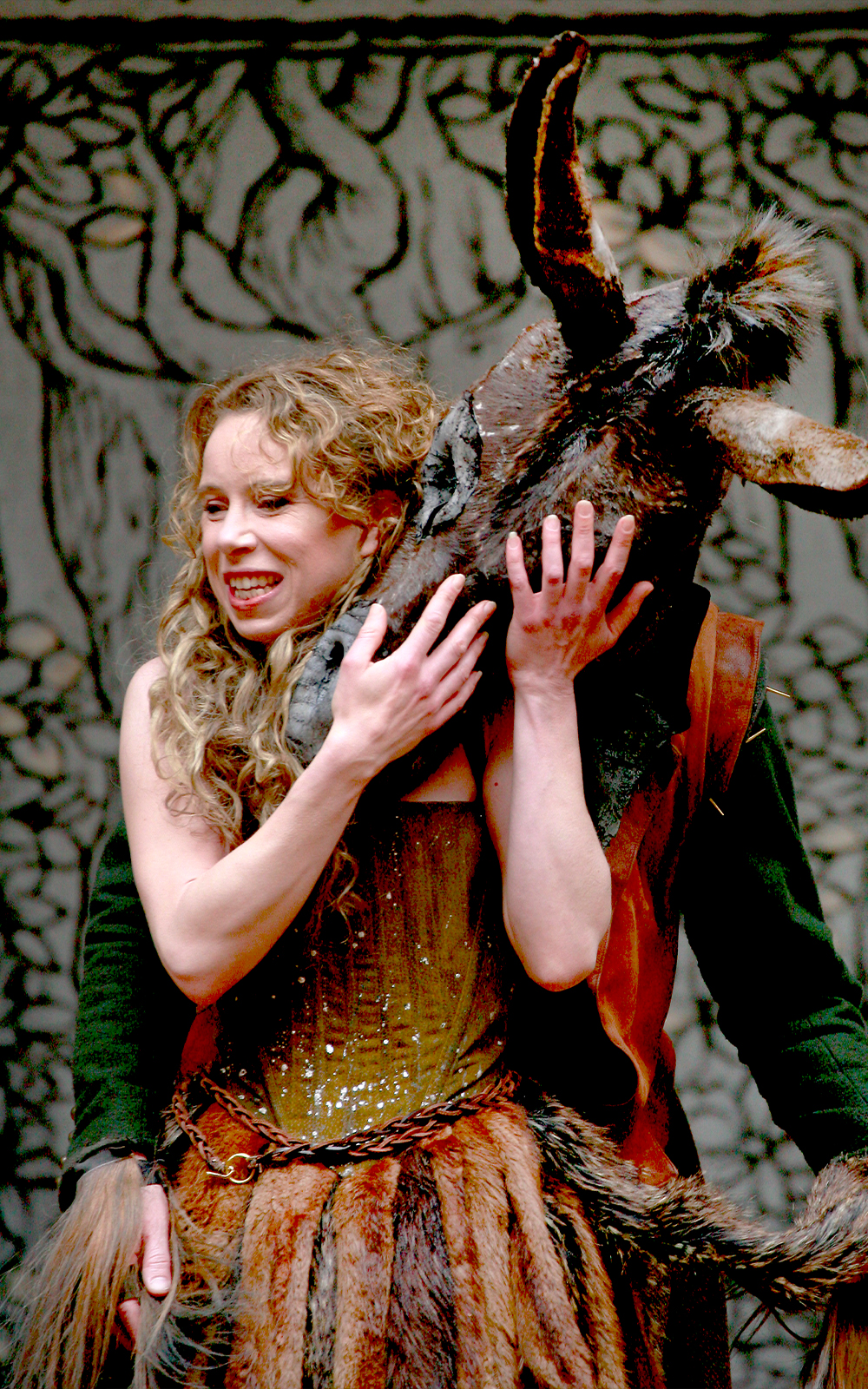 MIDSUMMER_2013_WATCH_STANDARD_6 An actress caresses the face of man who has a donkey's head.