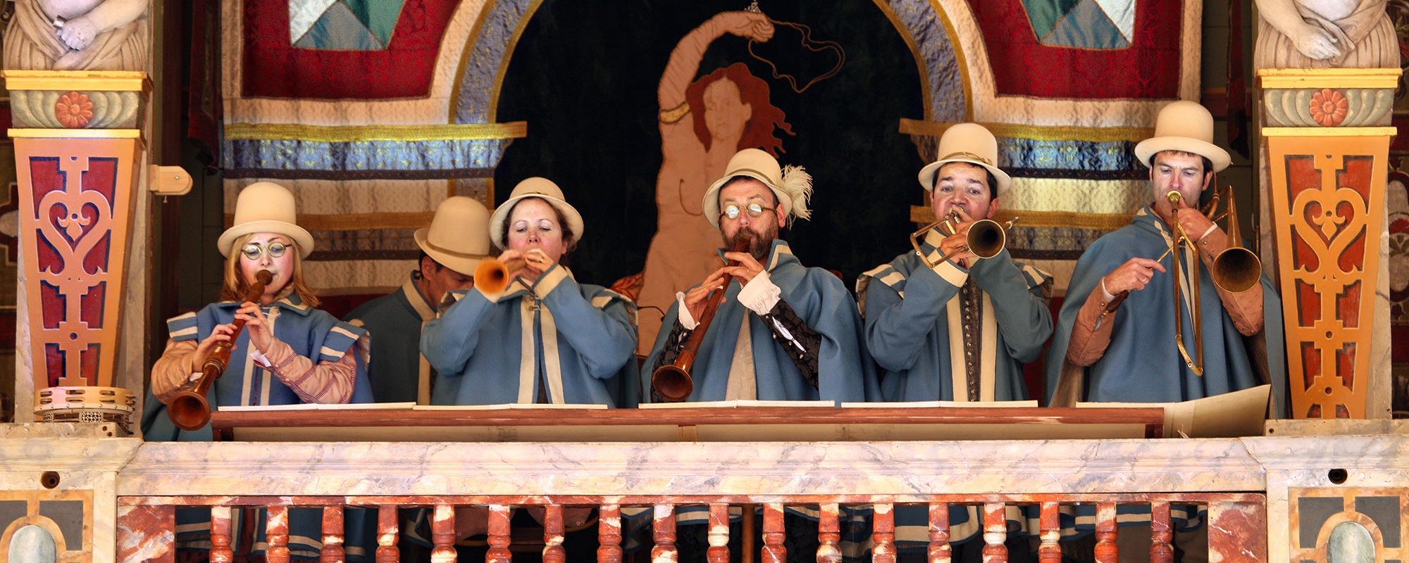 Musicians Gallery for Richard III Shakespeare's Globe Five musicians stand in the gallery of the Globe Theatre, playing their musical instruments.