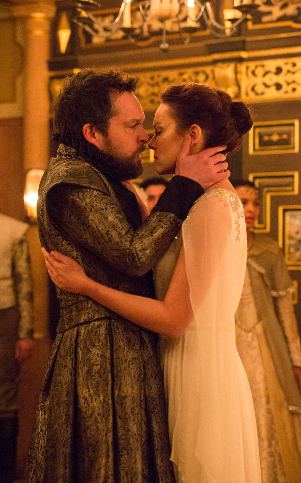 Hermione and Leontes The Winter's Tale Sam Wanamaker Playhouse 2016 A man and a woman hold each other, nose to nose.