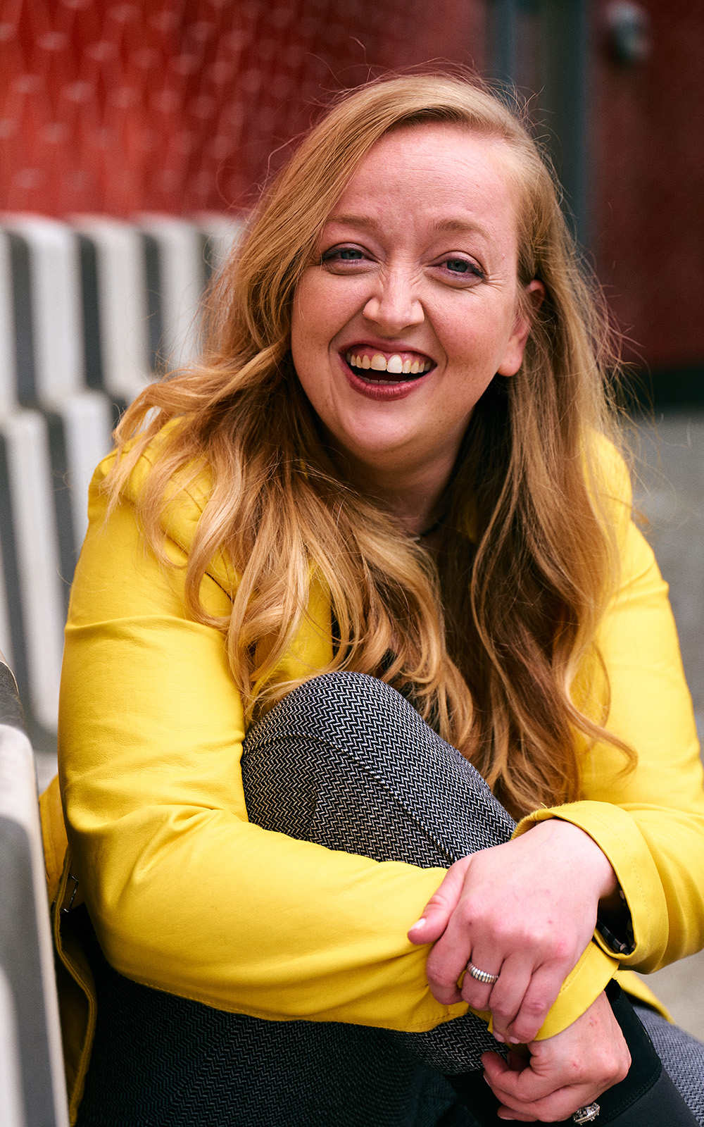 Athena Stevens Freelance Task Force Shakespeare's Globe A woman smiles warmly to camera.