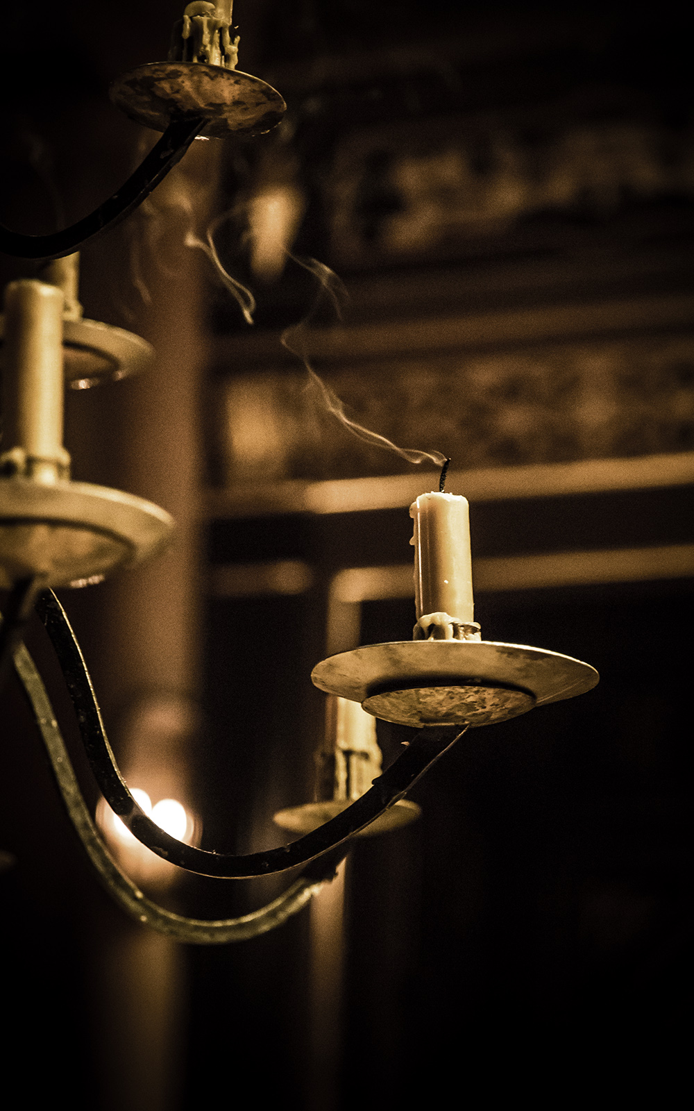 Shakespeare and Fear blog portrait Smoke rises from a candle that has recently been extinguished.