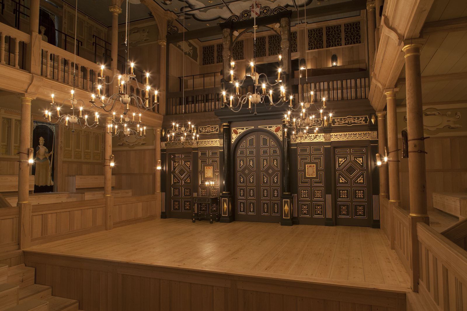 Sam Wanamaker Playhouse Pete Le May An indoor wooden playhouse lit by candles