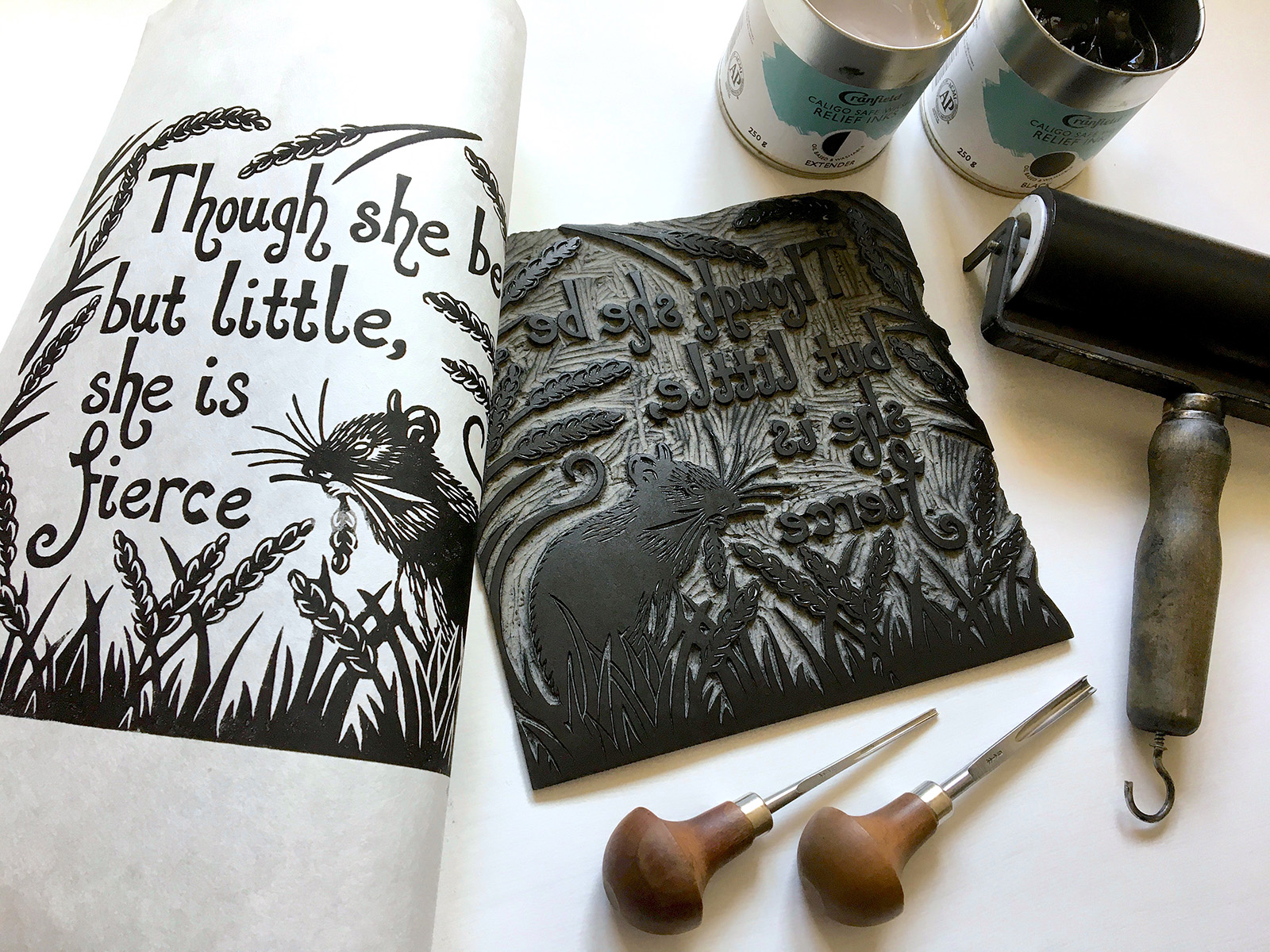 Inking and printing An ink print and block of a little mouse in a field with the text: Though she be but little she is fierce