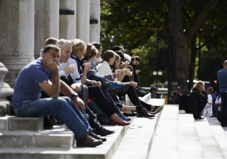 People sitting on church steps