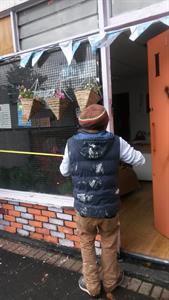 volunteers-measuring-shutters.jpg