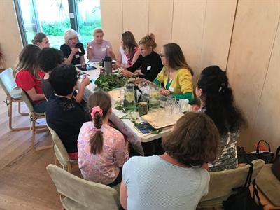 eleni-s-table-women-sitting-2.jpeg
