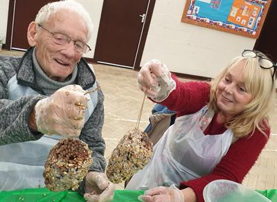 cliff-and-janette-birdfeeder-not-upside-down.jpg