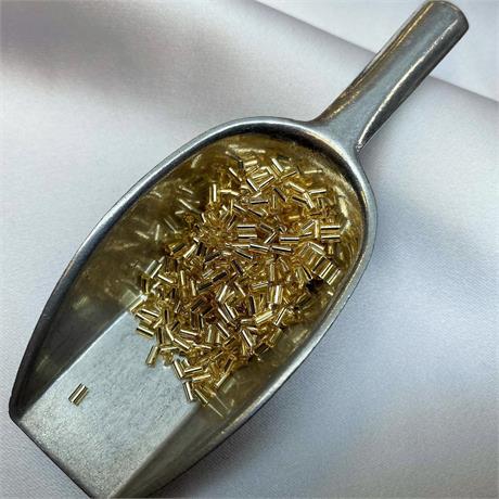 Toho Bugle Beads -  Silver-Lined Light Topaz Image 1