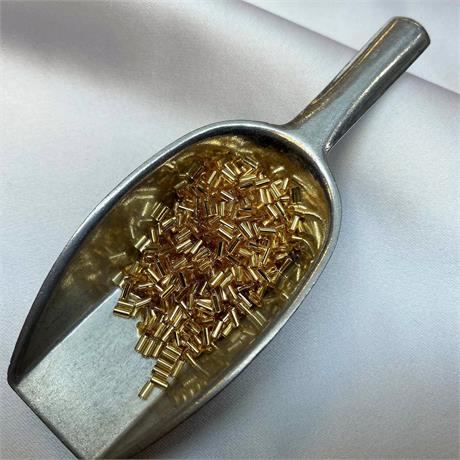 Toho Bugle Beads #1 -  Silver Lined Medium Topaz Image 1