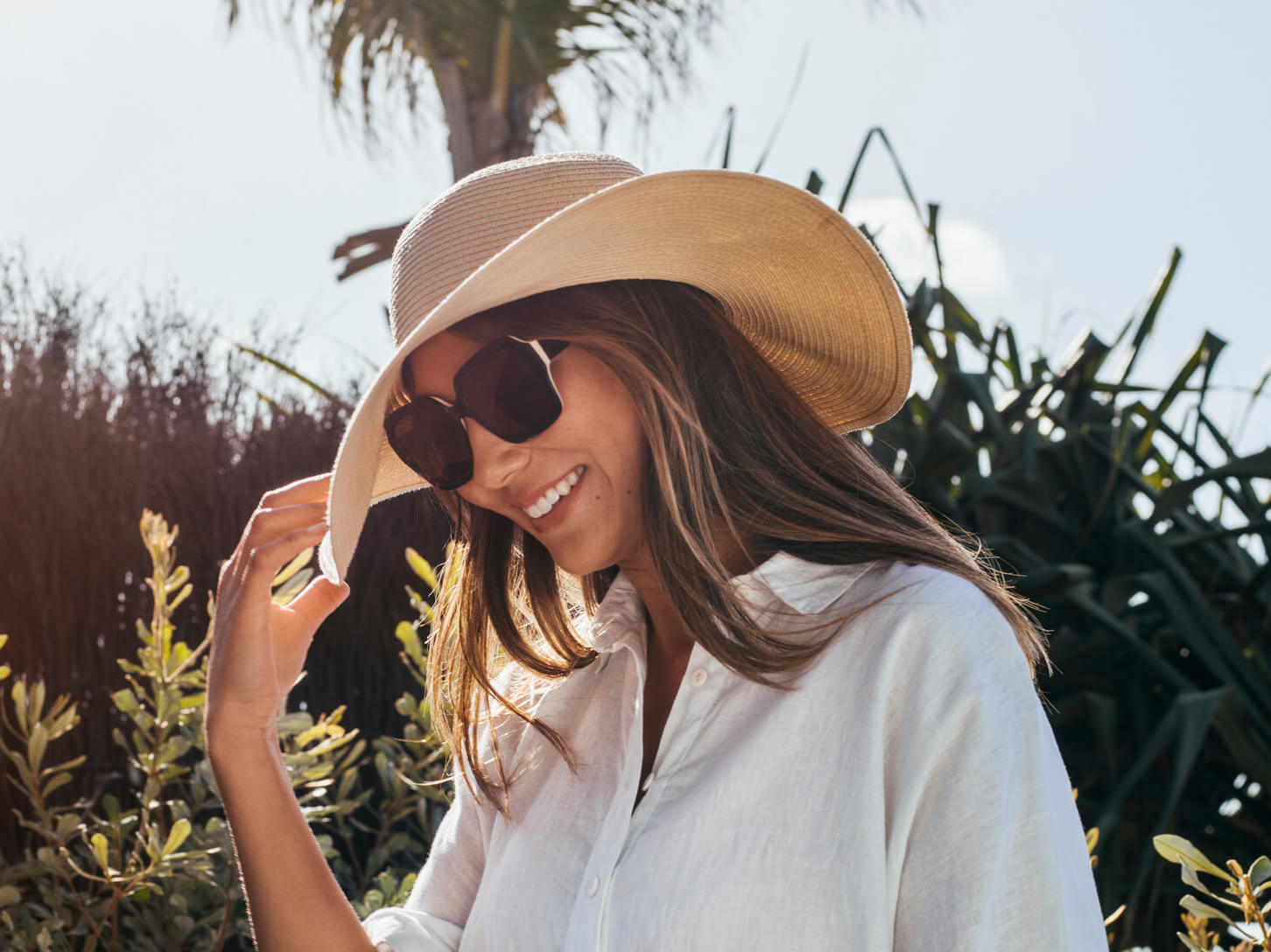 Christina in her hat wearing C ZAMPATTI SUN RX 18