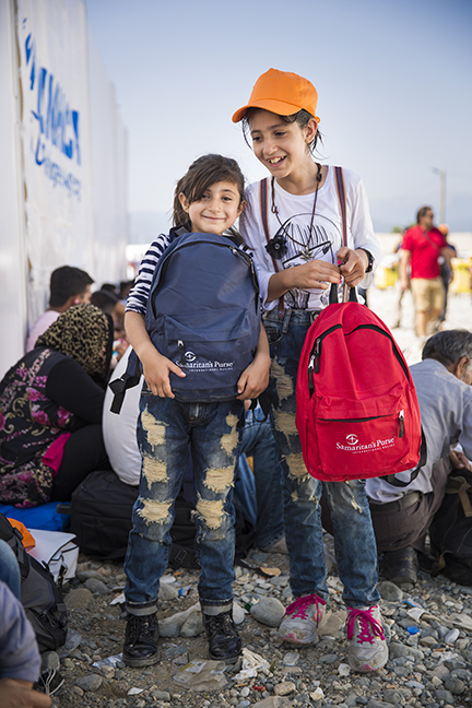 Tala, 11, and Tima, 9, from Syria received backpacks from Samaritan’s Purse on September 17.