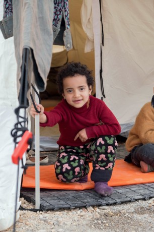 A refugee boy at Schisto Camp in Athens