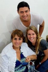 Emergency field hospital patient Diane (left) and her son, Jimmy, express their thanks to nurse Maranatha Weeks from Canada.