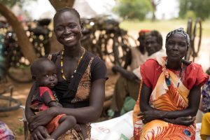 Rebeccah, food reciepient, mother of 3. Food Distribution near Akuem