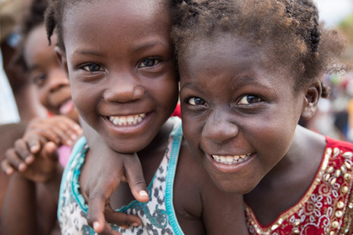 The hurricane did not wash away the smiles of Haitian children.