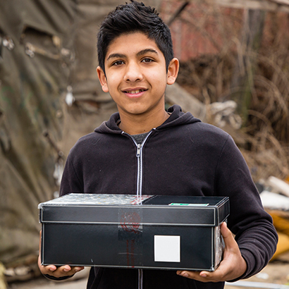 Teenage boy in Serbia with shoebox gift