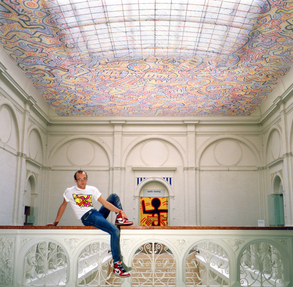Keith Haring underneath his velum, 1986. Stedelijk Museum Amsterdam Archive. Photo Tseng Kwong Chi © Keith Haring Foundation