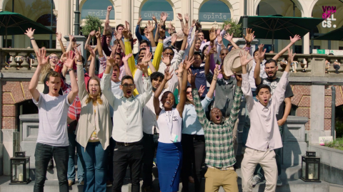 Big group of 2017 TFF finalist teams putting their hands up cheerfully, happy faces,