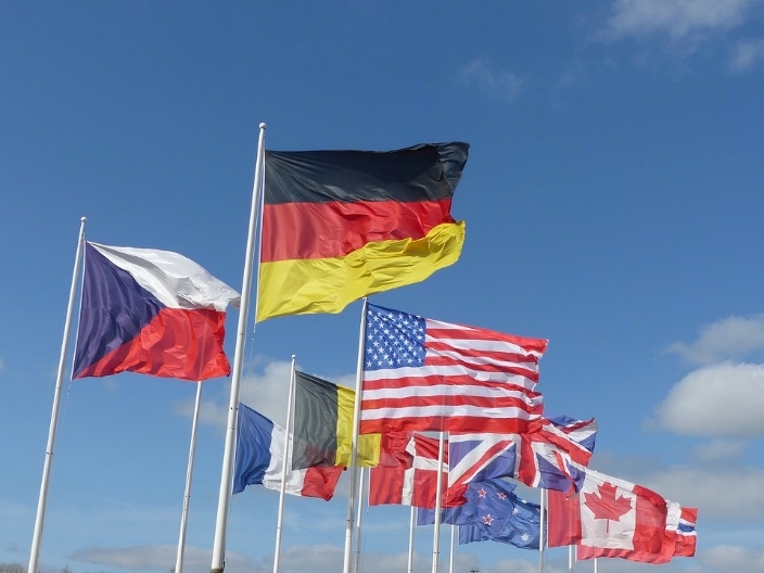 A red white and blue flag Description generated with very high confidence