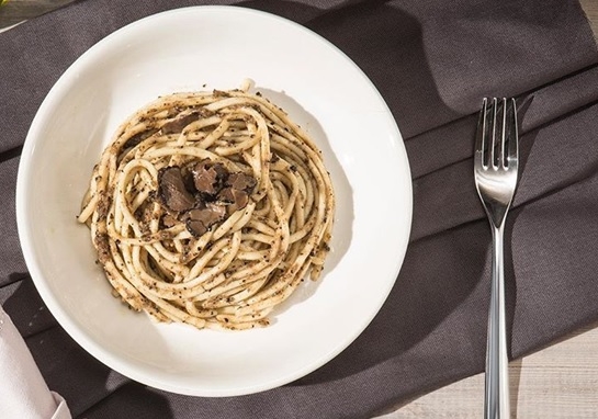 A close up of a plate of food on a table Description generated with very high confidence