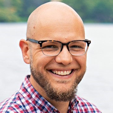 Adam L. Gustine