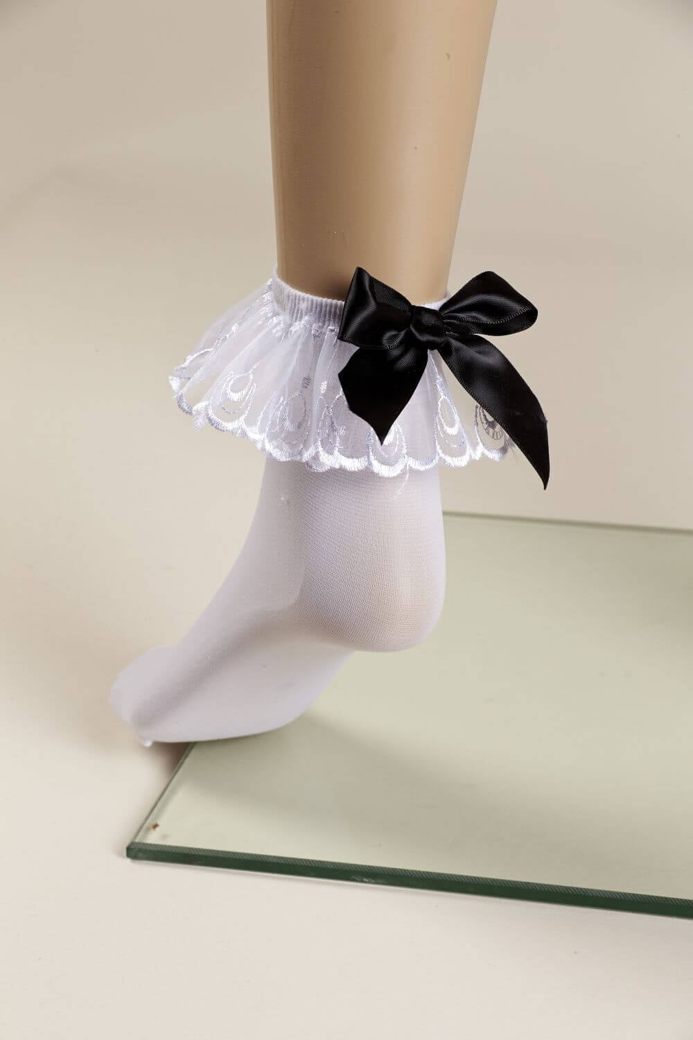 Coppens Sokjes Wit Met Zwarte Strik coppens kopen in de aanbieding